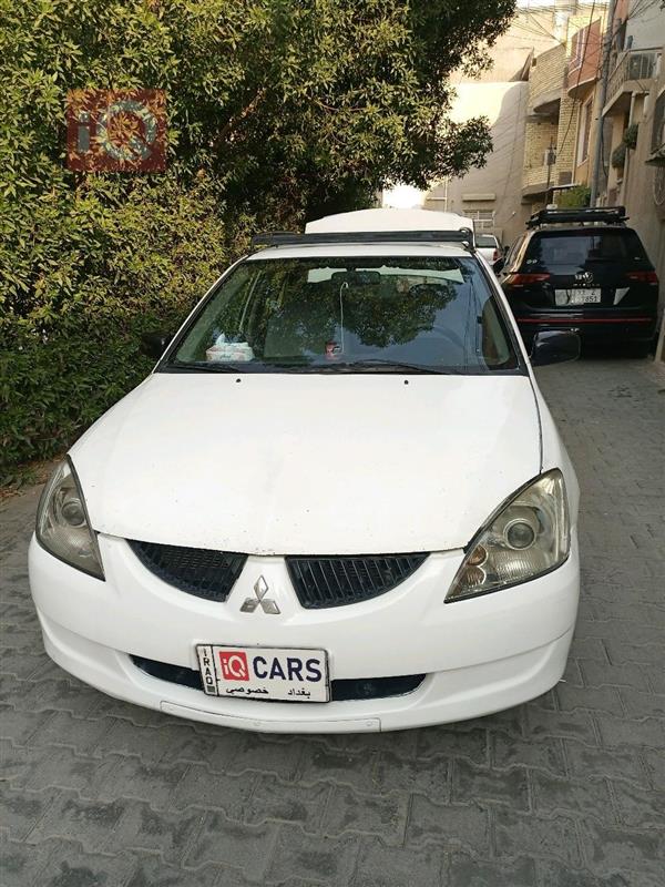 میتسوبیشی لانسەر 2004  بۆ فرۆشتن لە عێراق -  بەغداد